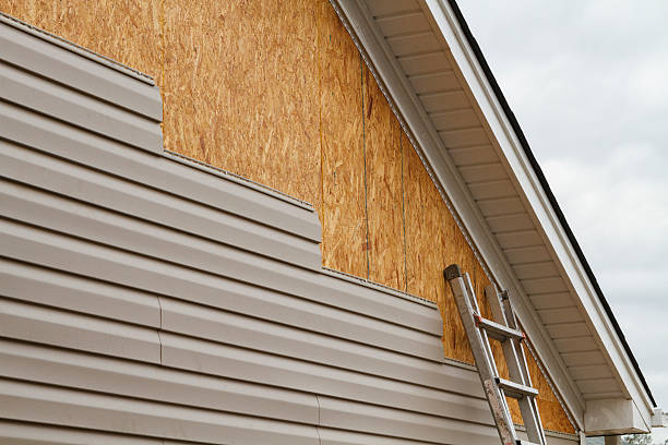 Professional Emergency Siding Repair technician working in Artemas, PA